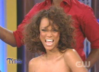 Illustration for article titled Tyra Unveils Real Hair; Interviews Evil Leprechaun